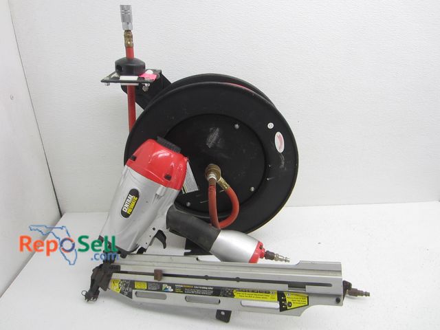 Lot 31-2428 - Retractable Hose Reel And 3-In1 Framing Nailer #98751