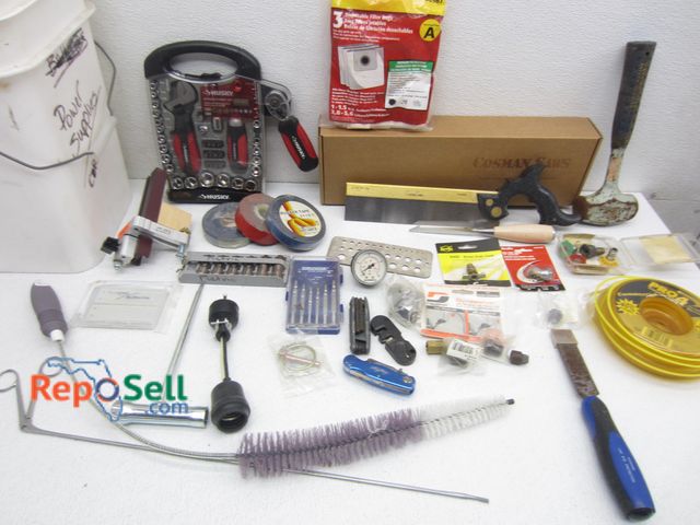 Lot 31-1295 - Bucket of Tools: Cosman Saw, Husky Stubby Set, Dynaswivel, Rubber Tape, etc.