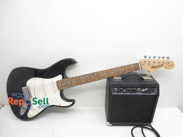 Lot 31-9293 - Fender Star Caster Electric Guitar, SP-10 Amp &amp; Stand