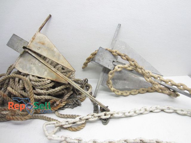 Lot 31-1255 - Two Danforth galvanized fortress anchors: (1) with approximately 100 ft of rope and (1) with two rub...