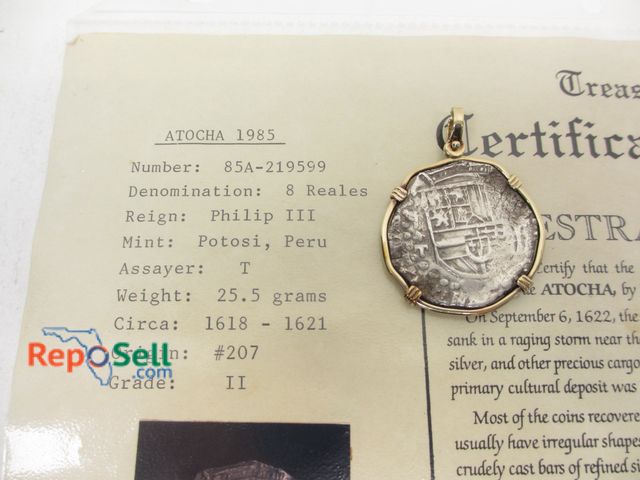 Lot 31-1000 - Atocha 1985 8 reales Phillip III Grade 11 Charm - 14K Yellow Gold Bezel - 30.11g total