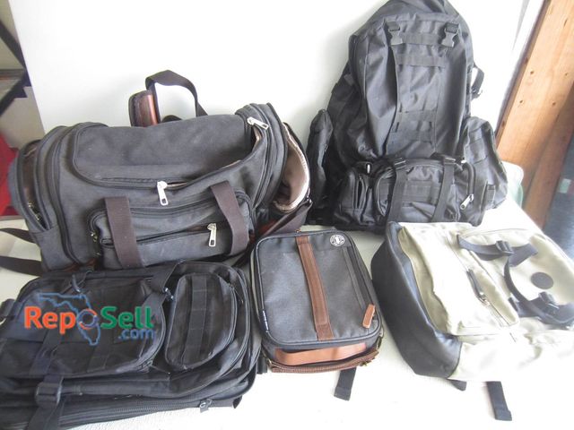 Lot 31-8634 - Five Assorted Backpacks, Duffel, And Insulated Lunch Bag