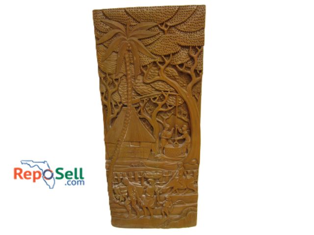 Lot 31-1284 - Large Solid Wood Carved Island Art Piece - 52" x 22