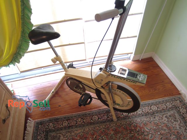 Lot 31-9036 - Vintage Tunturi exercise bike with manual controls and adjustable seat - Power On