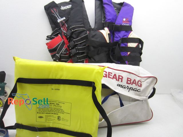 Lot 31-6330 - (2) Ski Vests Adult X-L, Floating Devise And Marpac Safety Gear Bag