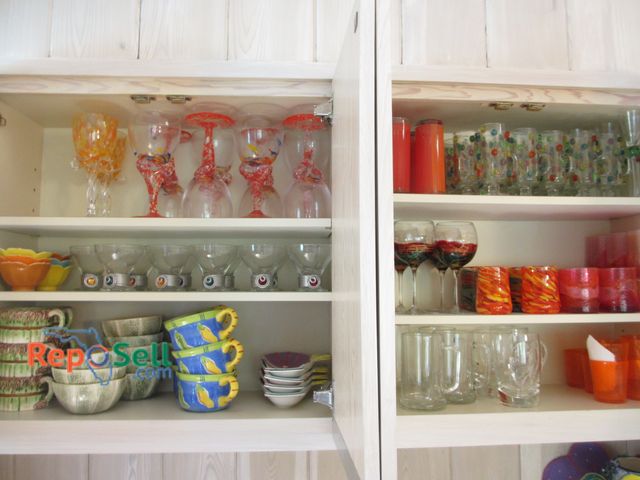 Lot 31-1190 - 2 Cupboards of Glassware - Wine Glasses, Cups, Mugs, Appetizer Dishes, etc. - Bring Totes