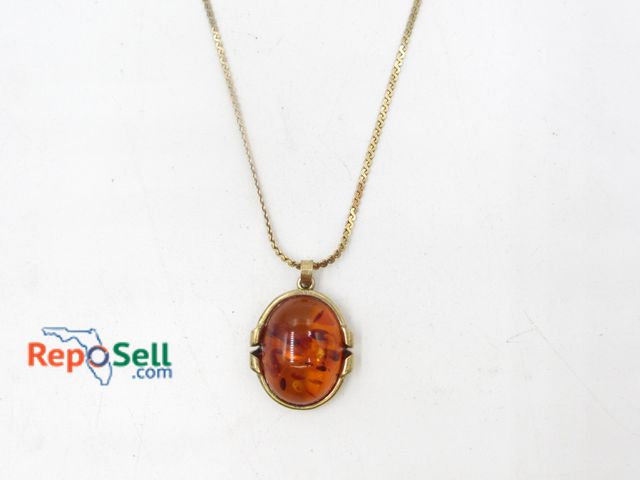 Lot 31-9253 - 14K Yellow Gold 14" Chain and Amber Locket - 7.27g total