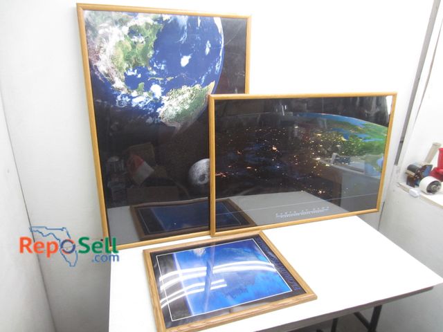 Lot 31-9388 - (3) space themed framed wall hangings, largest is 37" x 25"