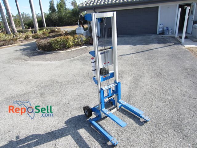 Lot 31-2585 - Genie Lift Mechanical  Equipment Lift (Tested)  350# Cap