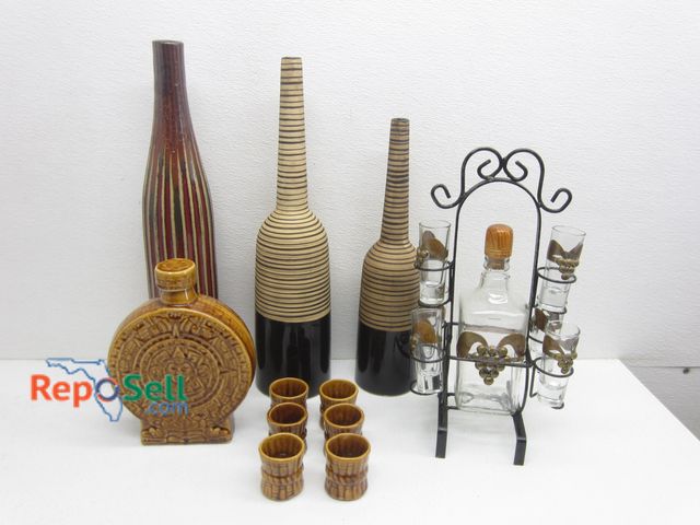 Lot 31-9494 - Brass And Glass Tequila Set, Aztec Liquor Bottle With (6) Glasses And (3) African Vases - Tote Inclu...
