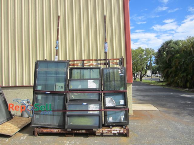 Lot 31-8354 - Large Metal L-Shaped Glass Stand 99"Lx32.5"Wx142"H - Stand Only, No Contents