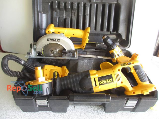 Lot 31-8571 - DeWalt Cordless Power Tool Set & (2) Batteries: Drill, Circular Saw, Reciprocating Saw, And Case