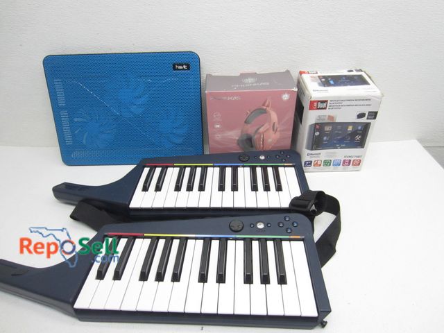 Lot 31-6303 - Misc. Electric Music Estate Lot: Keyboards, Laptop Fan, Multimedia Stereo Receiver, Etc.