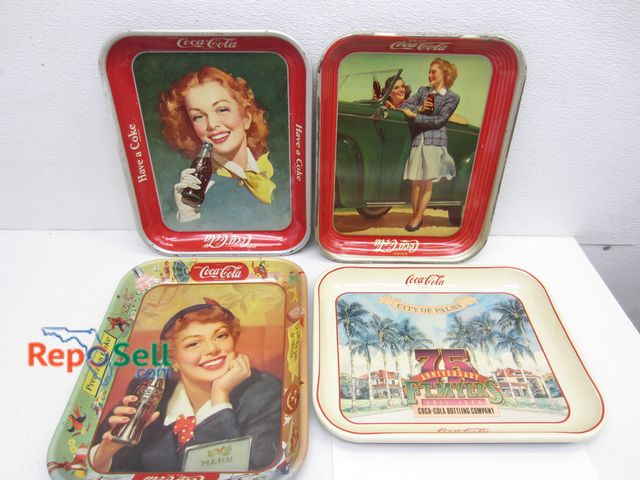 Lot 31-9384 - (4) Vintage Coca Cola Trays: 1942 Last WWII, 1948 First after WWII, 1951 French Canadian, 1986 Ft My...