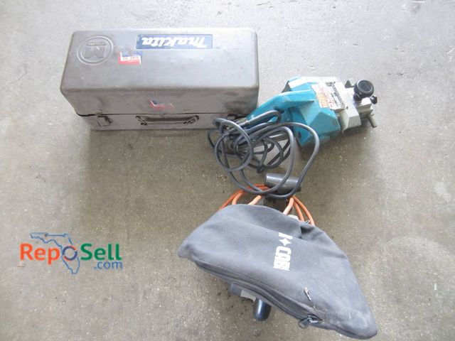 Lot 31-1357 - A Makita Planer And A Porter-Cable Sander. Both Powered On Per Known Details. The Set Comes With A M...