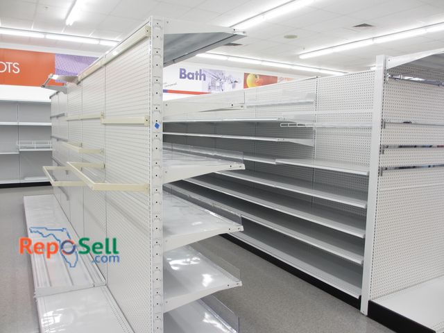 Lot 31-3065 - (2) Rows Double Sided Madix Peg Board w/(2) End Caps, 22" Deep Shelves. Buyer Must Disassemble &amp;...