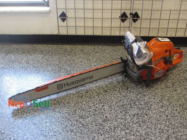Lot 31-1145 - New Husqvarna 592 XP gasoline chainsaw equipped with a 36" bar. Designed for high-performance cuttin...