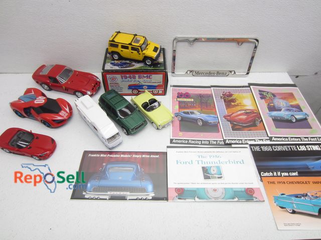 Lot 31-1060 - Lot Of Toy Car Collectables: (7) Die-Cast Cars Mostly Metal, Pamphlets, 1948 BMC Pedal Car Bank etc