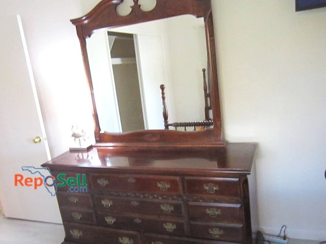 Lot 31-8639 - Nine Drawer Dresser With Mirror, Carved Detailing And Brass Handles - Bring Labor - 79" H w/Mirror x...