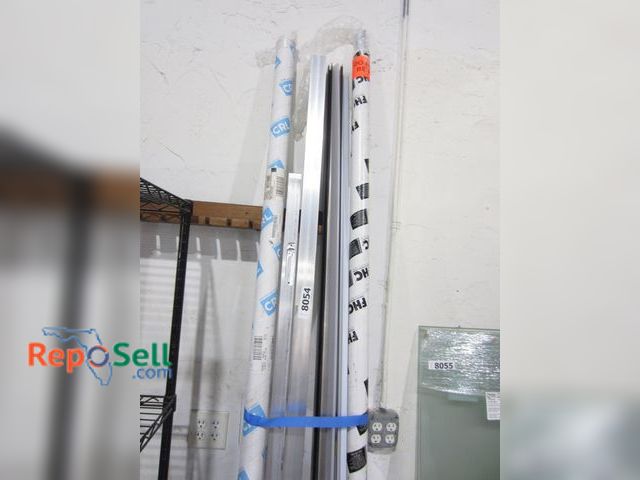 Lot 31-8054 - Lot of Aluminum Trim and stock. Longest piece is approx 8ft