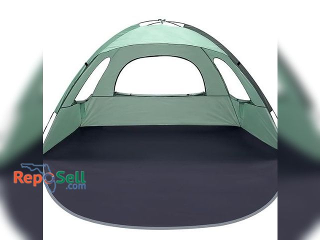 Lot 31-8220 - White Fang Folding Beach Tent - New