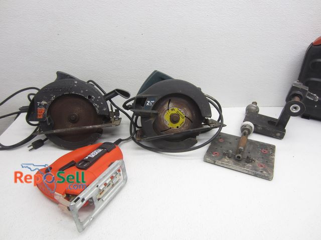 Lot 31-8568 - (2) Circular Saws, Jig Saw With Case And Pneumatic Grinder - All Corded Tools Power On