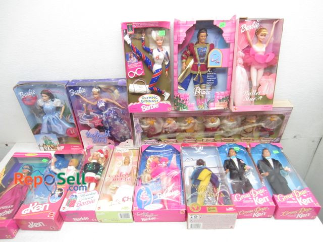 Lot 31-6082 - Lot of Seven Dwarves and (13) Barbies, all in original packaging.