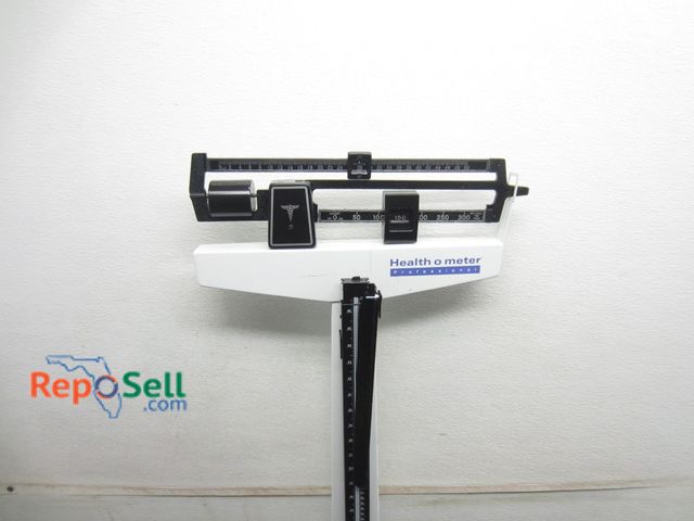 Lot 31-9203 - Health-O-Meter physician's scale with height rod
