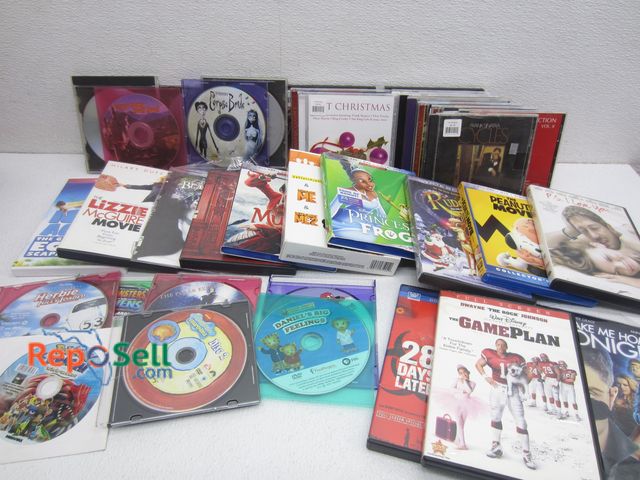 Lot 31-1076 - Lot of DVDs &amp; CDs: Frank Sinatra, Xmas Music, Minions Movie, Mulan, The Game Plan, etc.