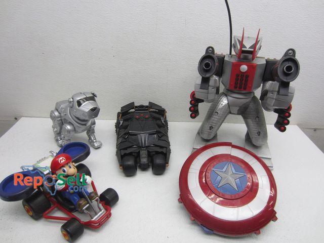 Lot 31-2088 - Lot of Collectible Toys: Cammandobot 3, Bat Mobil, Captain America Shield, etc.