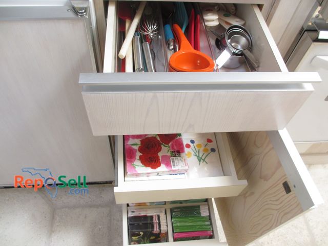 Lot 31-1188 - Contents of (3 Drawers) - Utensils, Measuring Cups, Large Lot of Paper Napkins - Bring Totes