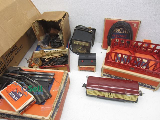 Lot 31-6123 - Lot of Lionel Trains, Tracks, Transformer: RCS, 022, 167, etc.