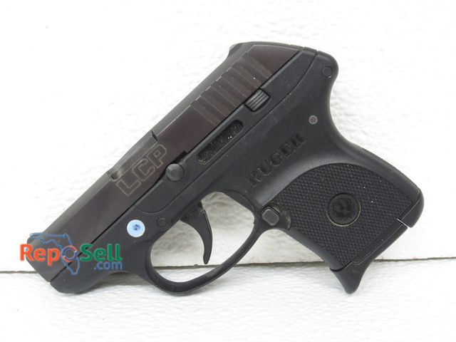 Lot 31-9158 - Ruger LCP .380 with one magazine and pocket holster and original box.