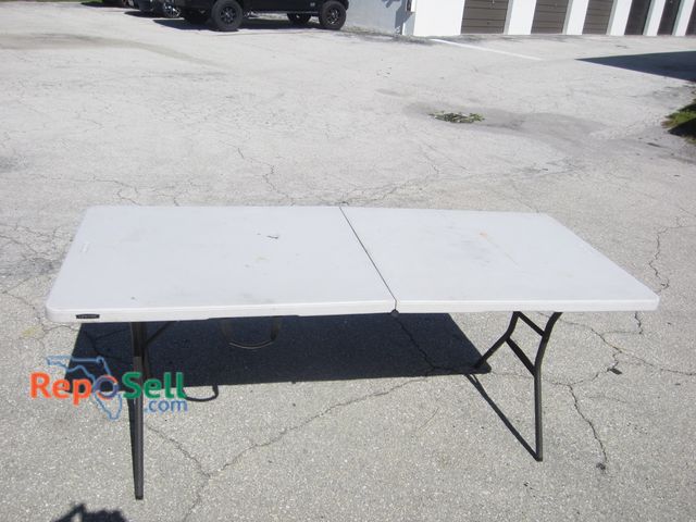 Lot 31-4193 - White 6' Lifetime Folding Table