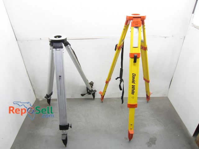 Lot 31-6419 - (2) Laser Tripods: David White And LSR