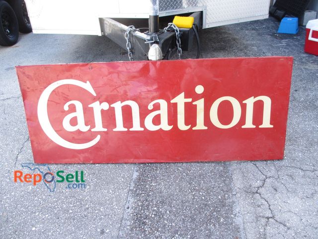 Lot 31-8069 - Metal &amp; Porcelain Sign: "Carnation", 58x23"