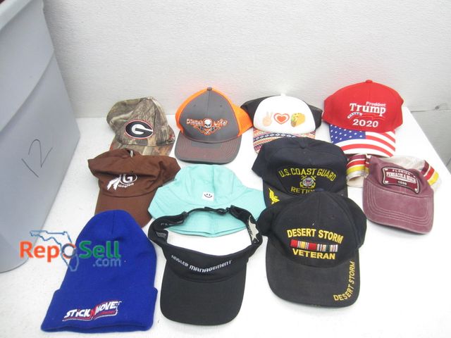Lot 31-7107 - 18 Gallon Tote With Hats, Assorted Styles - Pre owned