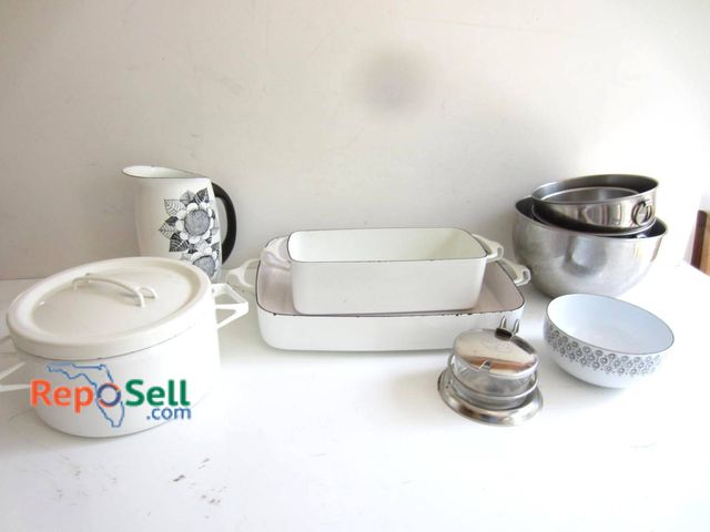 Lot 31-9172 - Kitchen items including white enamel dishes, bowls, and a pitcher with black floral detailing; a lid...