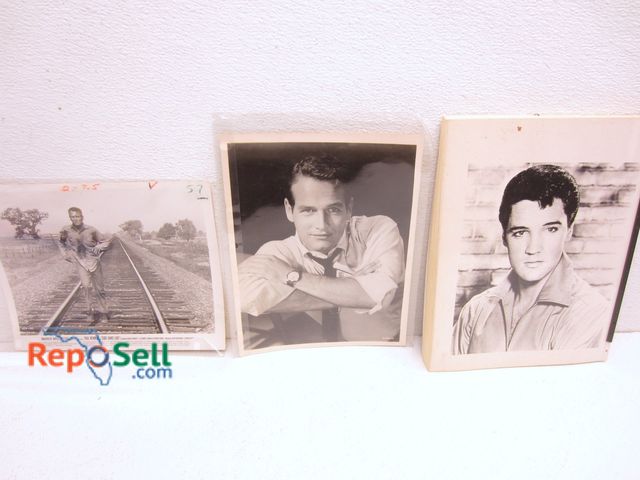 Lot 31-3293 - Paul Newman Photos and Elvis Book.