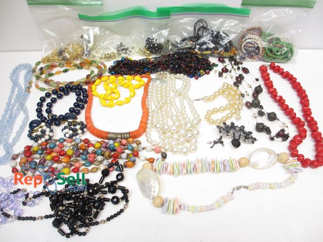 Lot 31-6016 - Lot of Costume Jewelry: Necklaces, Some Matching Earrings, Shell Necklace, Brooches, etc.