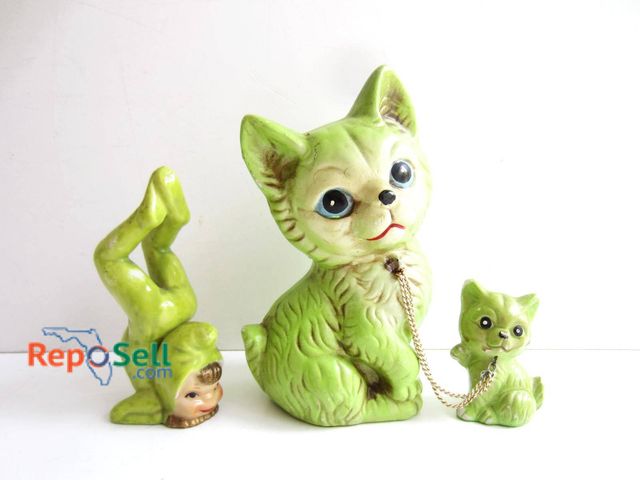 Lot 31-9310 - Relco ceramic cat figurine with a green finish made in Japan with smaller matching kitten figurine. ...