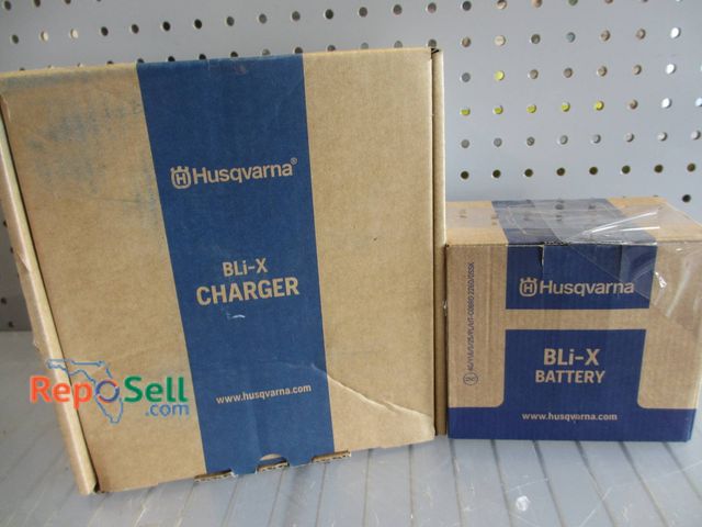Lot 31-1166 - New Husqvarna BLi-X Charger and Battery set, including models 40-B220X Li-Ion Battery (Part No. 9760...