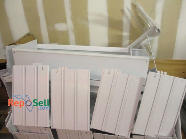 Lot 31-3049 - Lot of Metal Shelving Materials - White