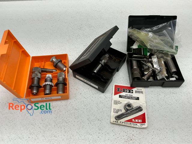 Lot 31-1456 - 44 Mag reloading die sets in an orange plastic case, additional die replacement parts in a black cas...