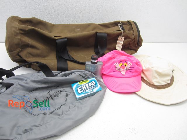 Lot 31-8580 - Estate Lot: Duffle Bag, Hats, Cologne, etc.