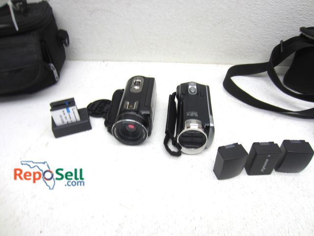 Lot 31-9241 - (2) Digital Video Cameras With Acces And Batteries: IR 2.7K HD DVC (Power On) And Samsung HHMX-F90
