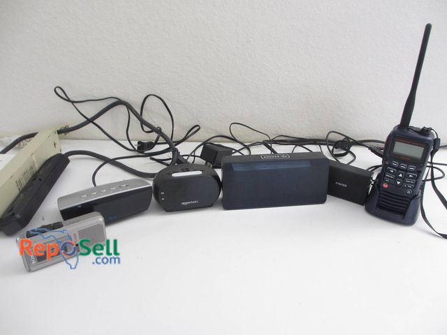 Lot 31-8548 - Electronics Lot: Handheld Radio, Speakers, Power Strips, Sony Recorder