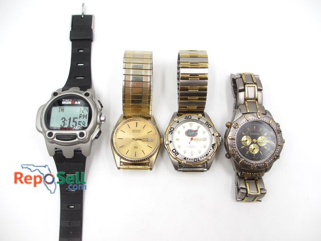 Lot 31-9324 - (4) Men's Watches All with New Batteries: Timex Ironman, Seiko, FL Gators, Titanium