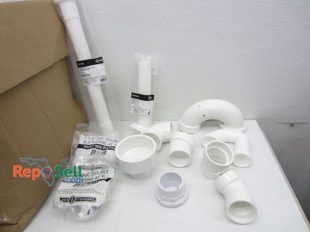 Lot 31-4128 - Large Lot of New PVC Fittings, Plastic Slip Joints, Tail Pieces, etc.