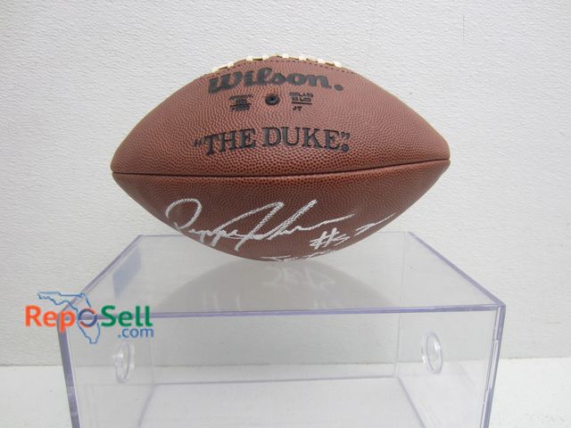 Lot 31-8405 - NY Jets Pepper Johnson Signed NFL Duke Football w/Display Case - No COA
